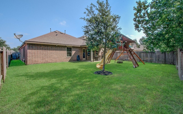 view of yard featuring a playground