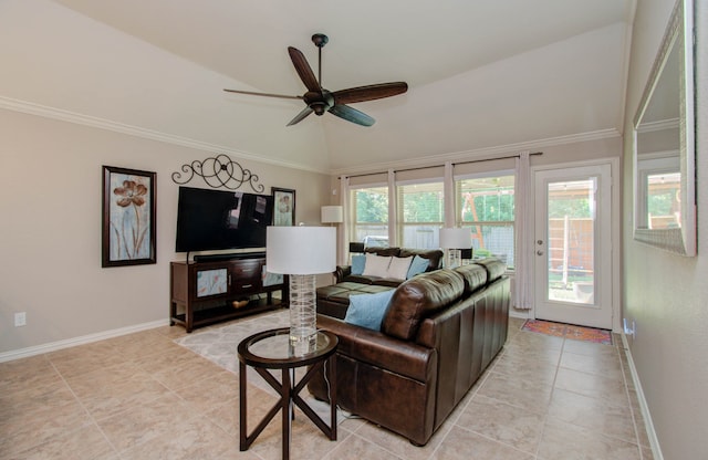 living room with light tile patterned flooring, a wealth of natural light, lofted ceiling, and ceiling fan