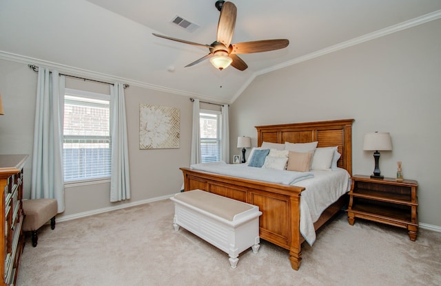 bedroom with multiple windows, vaulted ceiling, light carpet, and ceiling fan