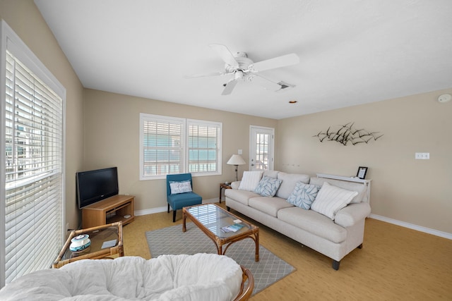 living room with ceiling fan