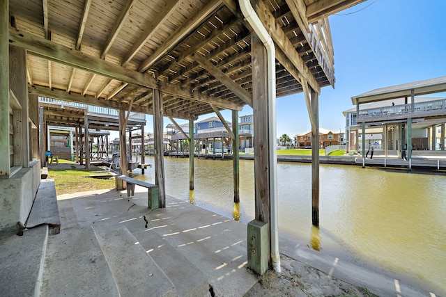 dock area featuring a water view