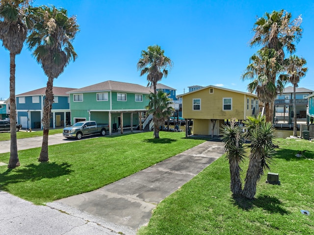 view of property's community with a yard