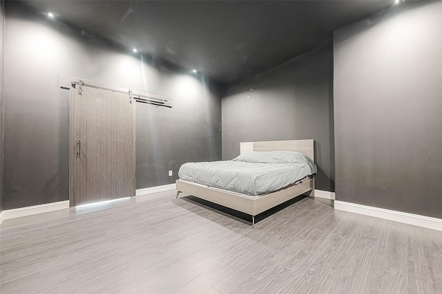 bedroom featuring light wood-type flooring