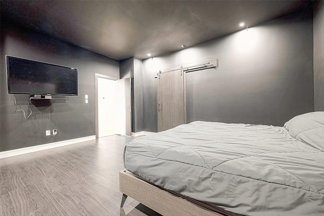 bedroom featuring light hardwood / wood-style floors