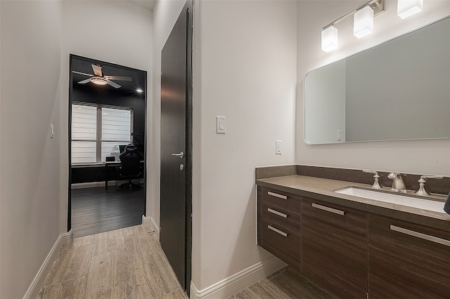 bathroom with vanity and ceiling fan