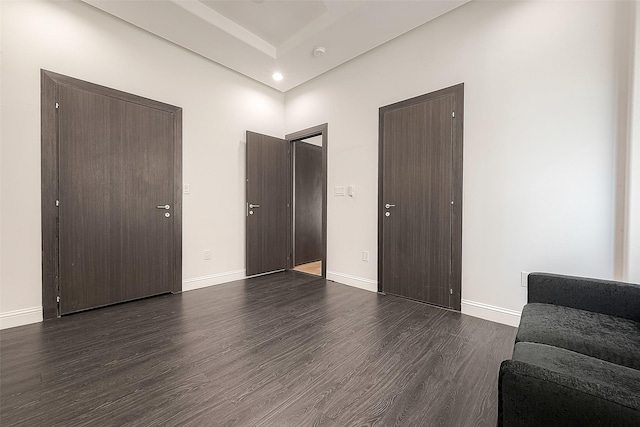 interior space with dark hardwood / wood-style flooring