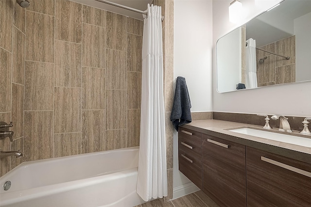 bathroom featuring vanity and shower / tub combo