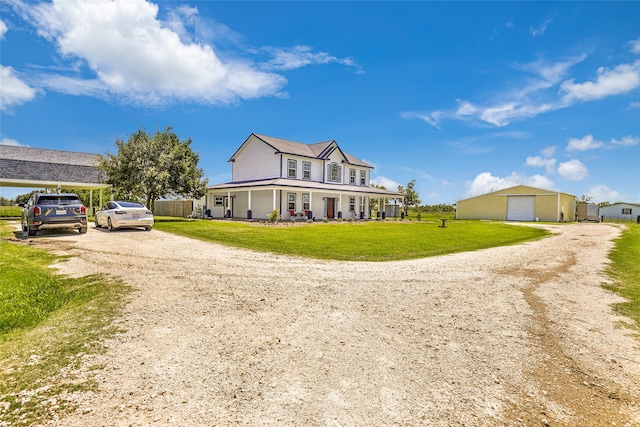 view of front facade featuring a front lawn and covered porch