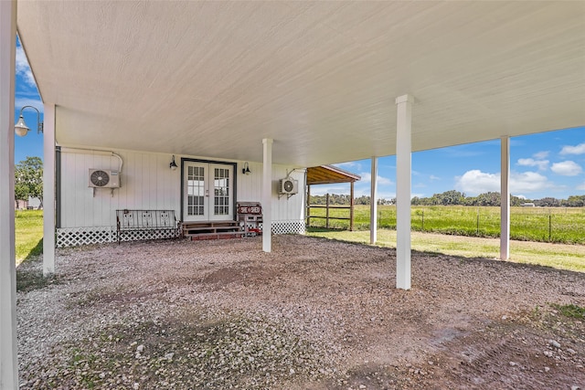 view of patio / terrace with a rural view and french doors