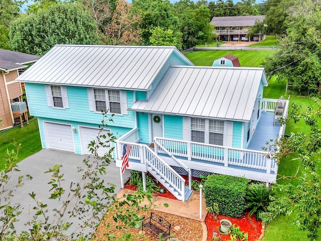 view of front of property with a porch and cooling unit