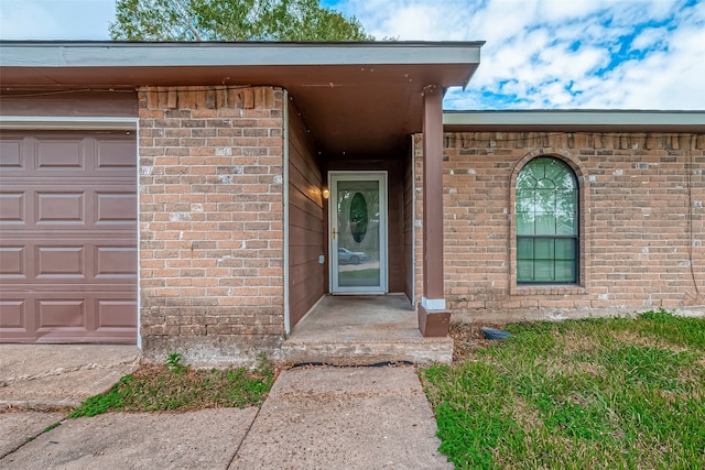 property entrance with a garage