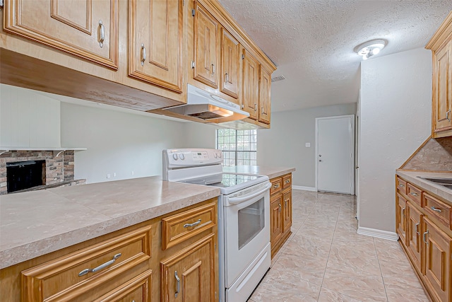 kitchen featuring a brick fireplace, a textured ceiling, white electric range oven, and light tile patterned floors