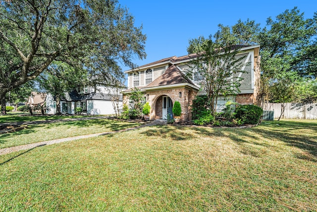 view of front of home featuring a front lawn