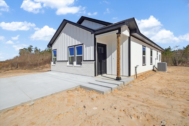 view of home's exterior with central AC unit