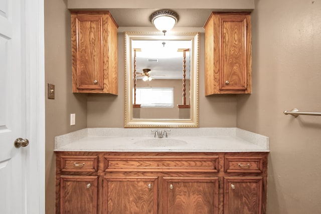 bathroom featuring vanity and ceiling fan