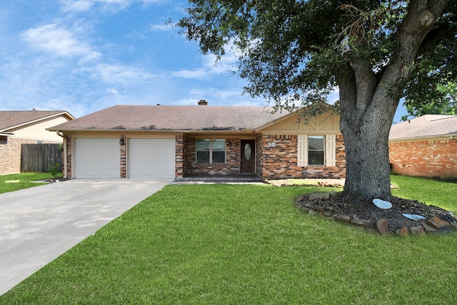 ranch-style home with a garage and a front yard