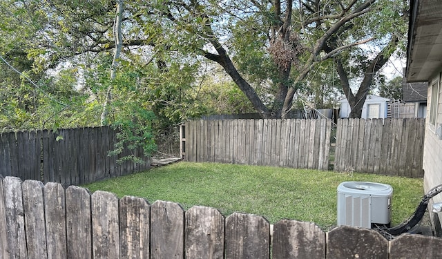 view of yard featuring central AC unit