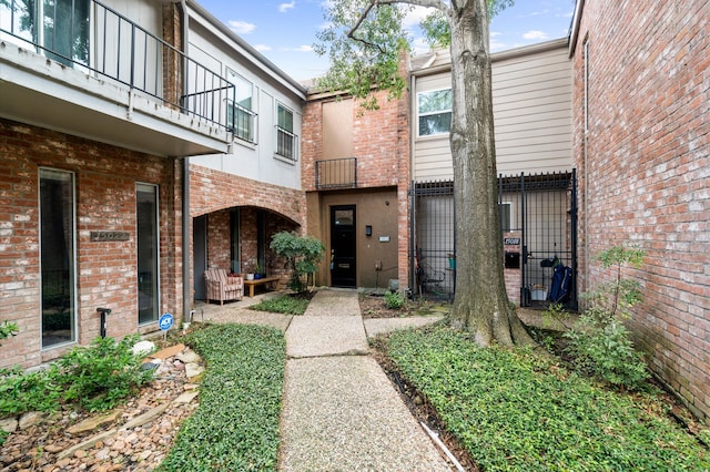 property entrance with a balcony