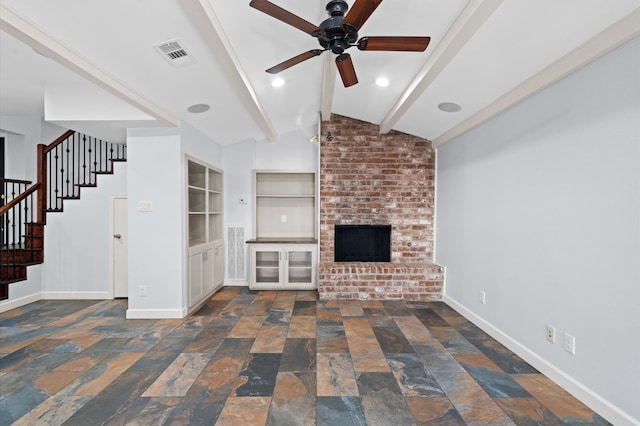 unfurnished living room featuring a brick fireplace, ceiling fan, built in shelves, and lofted ceiling with beams