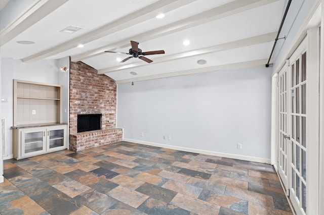 unfurnished living room featuring a brick fireplace, ceiling fan, and lofted ceiling with beams