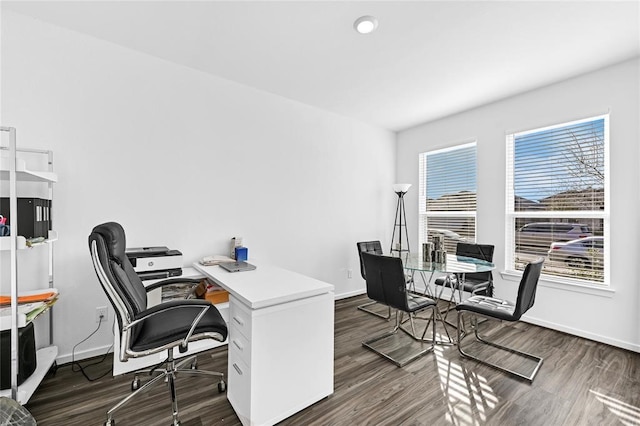 office area featuring plenty of natural light and dark wood-type flooring