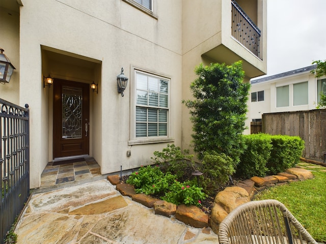 doorway to property with a balcony