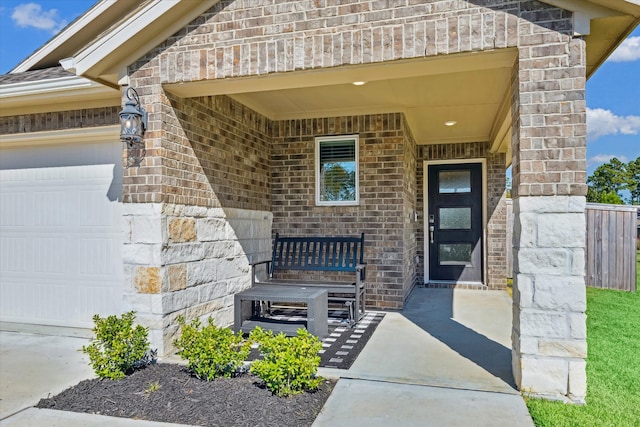 property entrance with a garage