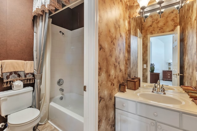 full bathroom with vanity, toilet, and shower / tub combo