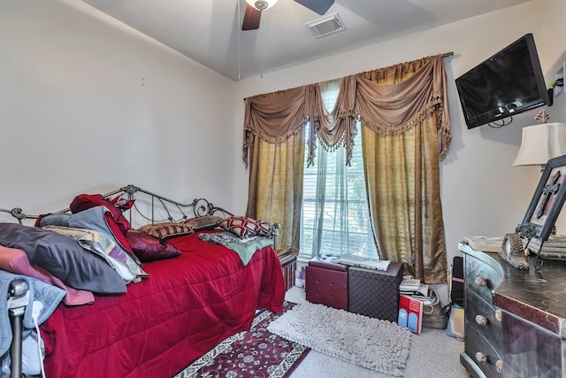 bedroom featuring ceiling fan and carpet floors