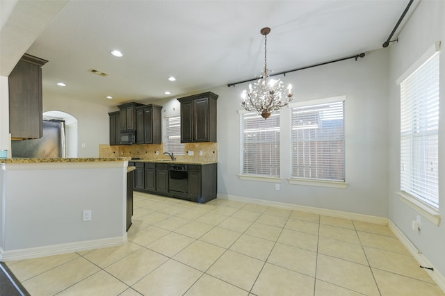 kitchen featuring dark brown cabinetry, black appliances, light tile patterned floors, and backsplash