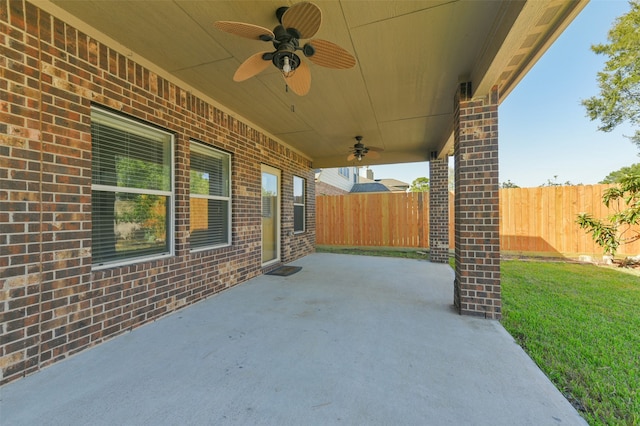 view of patio featuring ceiling fan