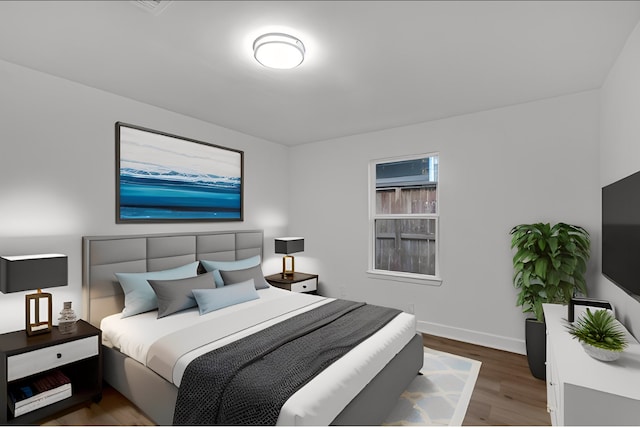 bedroom featuring dark hardwood / wood-style floors