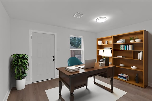 office area with hardwood / wood-style floors