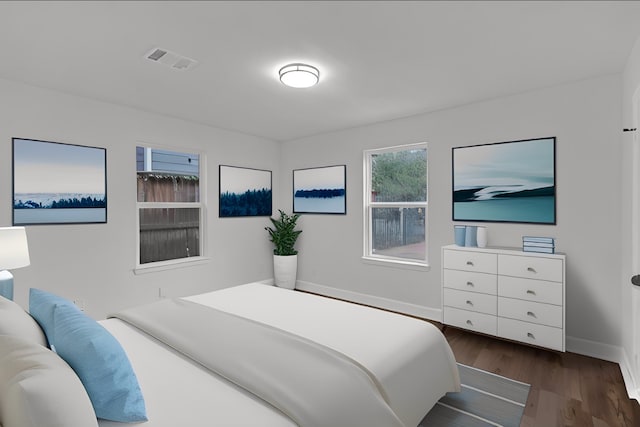 bedroom with dark wood-type flooring