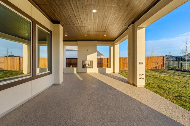 view of patio featuring exterior fireplace