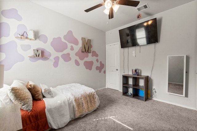 bedroom with ceiling fan and carpet floors