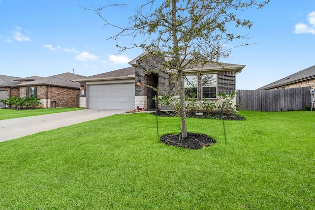 ranch-style home featuring a garage and a front yard