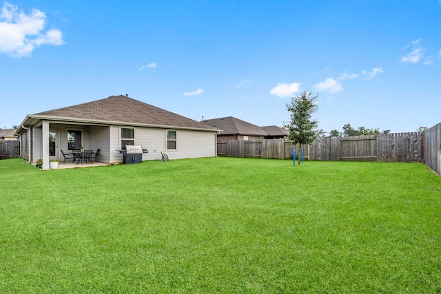 view of yard with a patio area