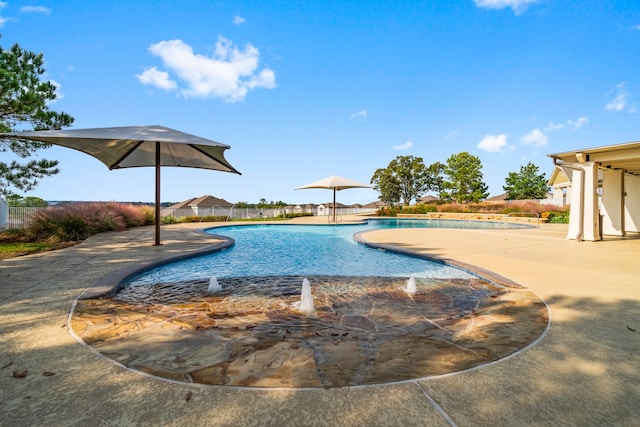 view of swimming pool featuring a patio