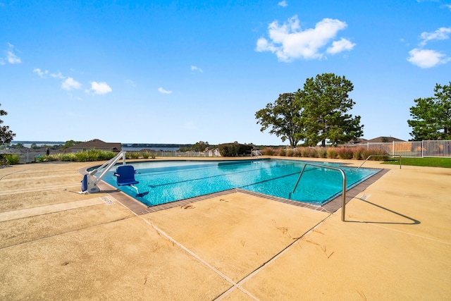 view of pool featuring a patio area