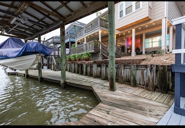 dock area with a water view