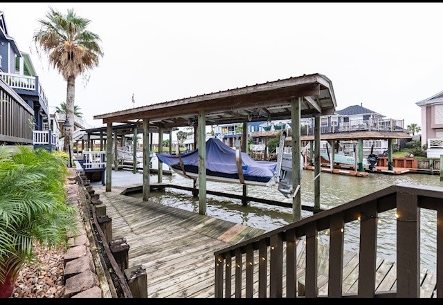 dock area featuring a water view