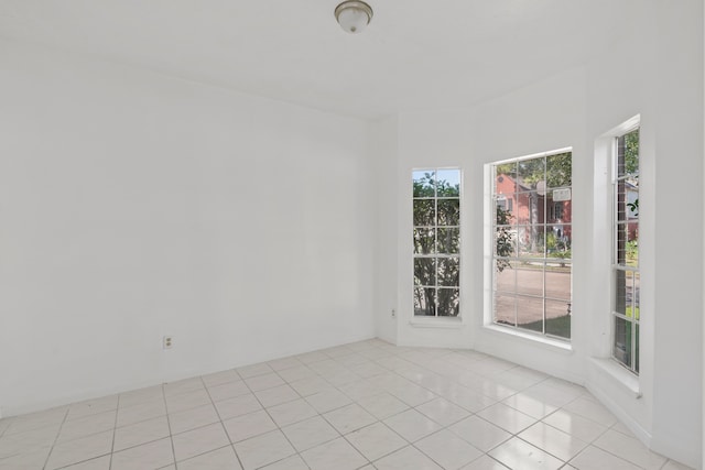 view of tiled spare room