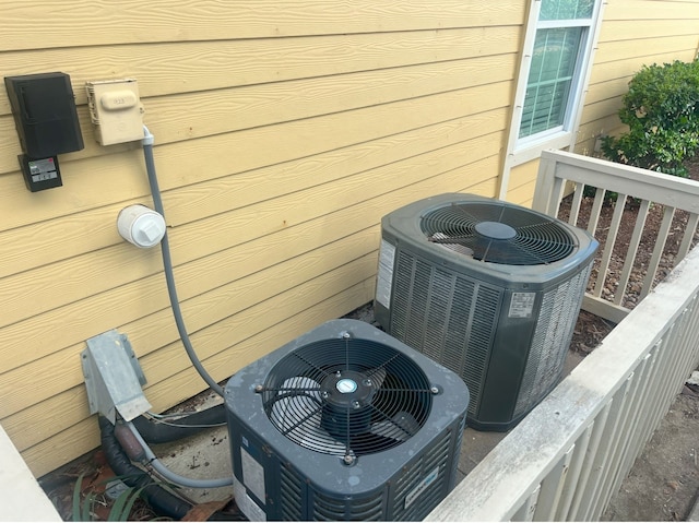 details with wood walls and central AC unit