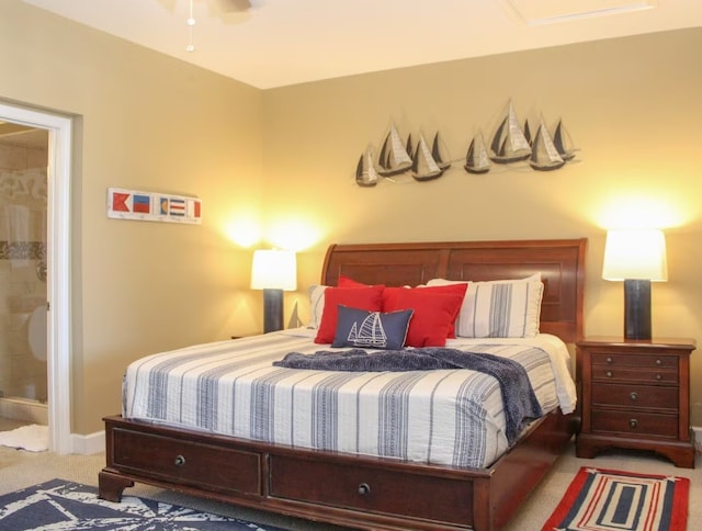 carpeted bedroom with ensuite bathroom