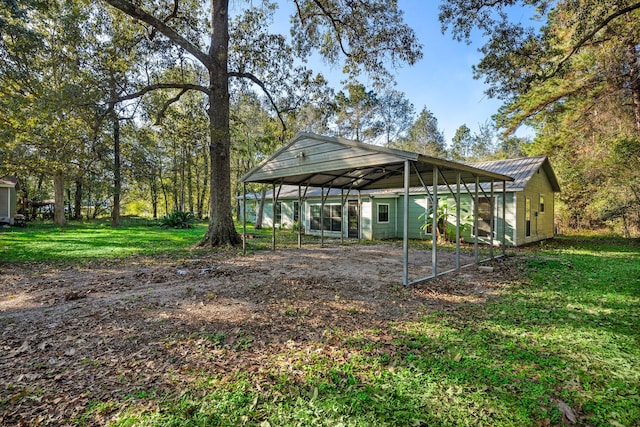 view of yard featuring a carport