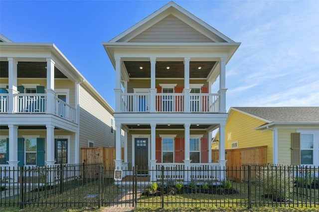 view of front of home featuring a balcony and covered porch