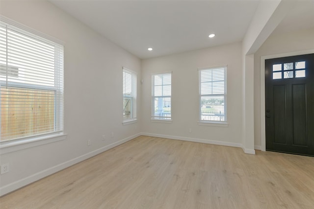 entrance foyer with light wood-type flooring