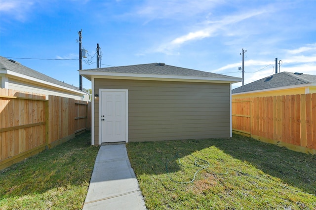 view of outdoor structure with a yard