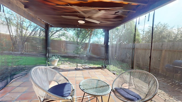 view of patio / terrace featuring ceiling fan